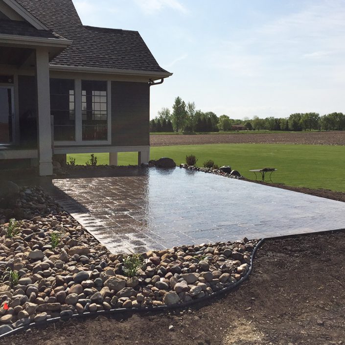 decorative stonework surrounds rock terrace