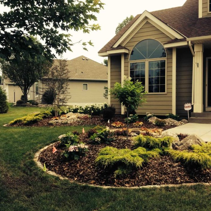 Beautifully landscaped front yard of a home in Hastings, Minnesota